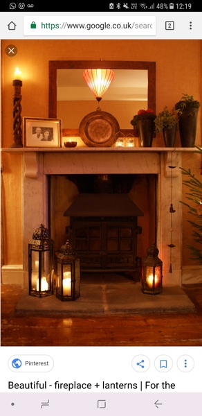 How would you decorate this fireplace?