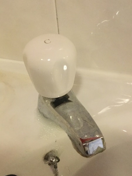How do I get the top off this tap?