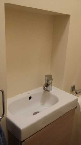 How would you tile this recessed splashback?