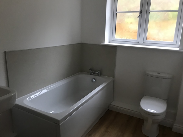 How could you add a shower to this bathroom?
