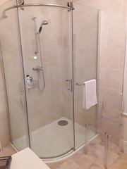 Replacing a curved glass shower sweep (?)...