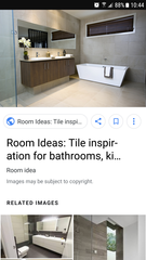 New modern bathroom...tile down to floor or re-fit the skirting boards?