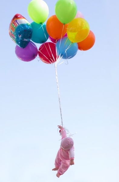 Ballons on babies.