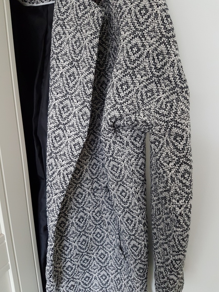 The pattern on this coat...