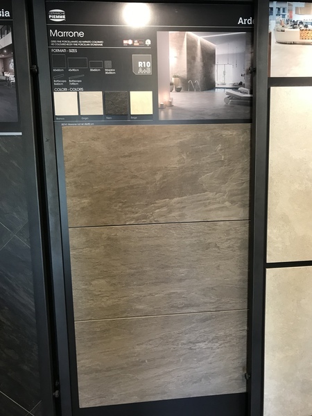 High quality wood tile throughout or combo of regular tile and real wood?