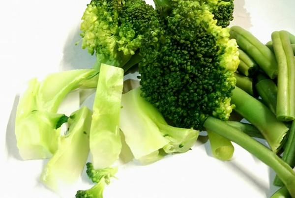 To hack off the stalk of the broccoli