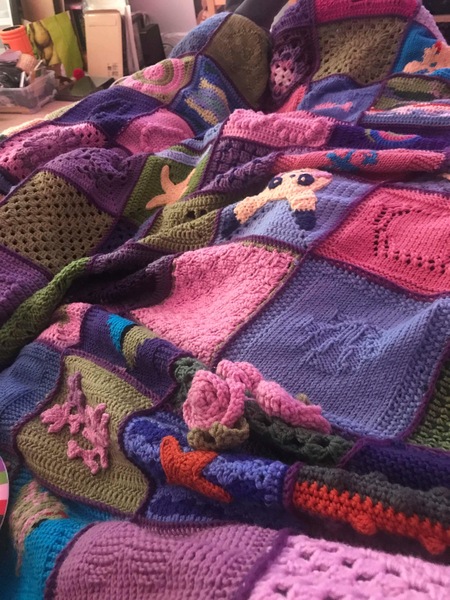 Woolly Hugs. Remembering Joseph, we are making a blanket for Trazzletoes and family, can you help?