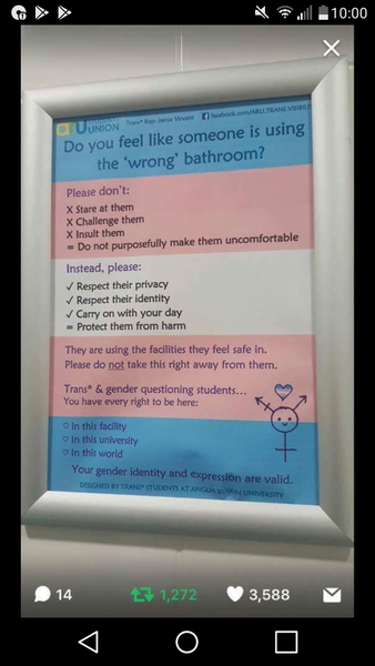 "Wrong bathroom" sign in university toilet
