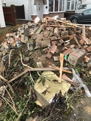 Neighbour’s massive pile of rubble - Aibu to complain (but to who?)