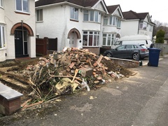 Neighbour’s massive pile of rubble - Aibu to complain (but to who?)