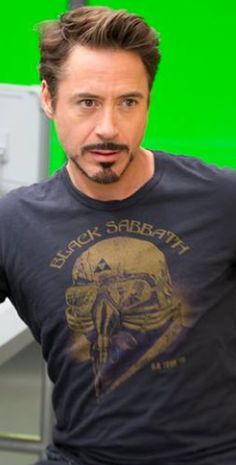AIBU. To think that 49 is not too old to wear a band tshirt?