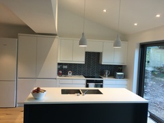 What colour scheme would you choose for a sleek modern kitchen?
