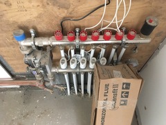 How much is involved in adding a hand held shower to this bath (see photo)