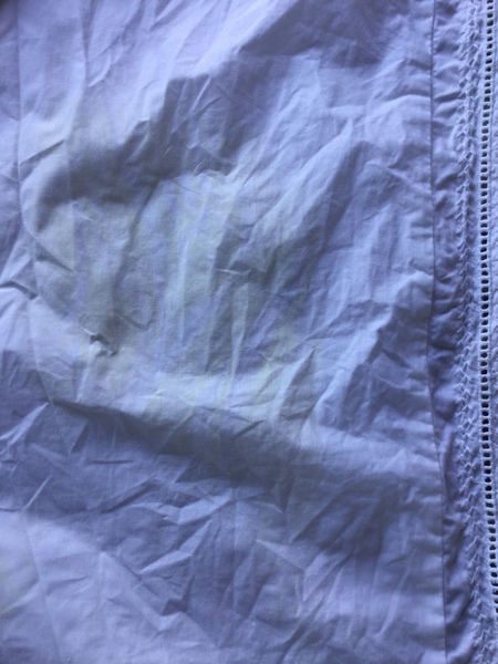 Waaaah! What the bloody hell is all over my new pillowcase and how do I get rid of it? Sunscreen?