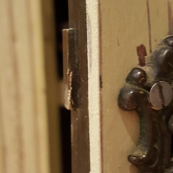 Help me unlock this cupboard