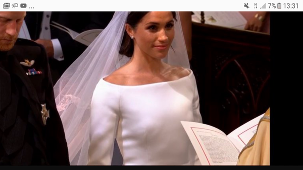 Meghan's dress was lovely but lumpy looking,/ill fitting bra look