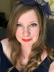 Does the red lipstick suit me?