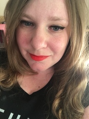 Does the red lipstick suit me?