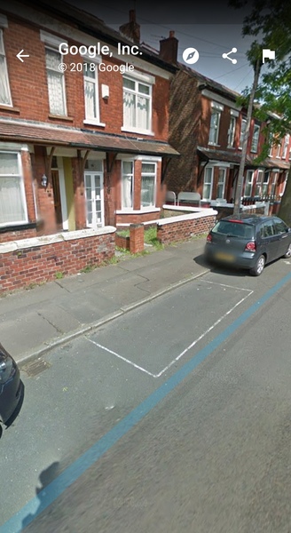 Actual cones in front of someone's house!