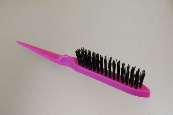 How do you get volume in the back of your hair?