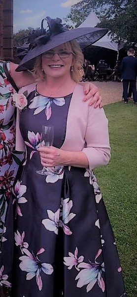 What can I wear with this dress to cover my upper arms? Mother of the Bride outfit.