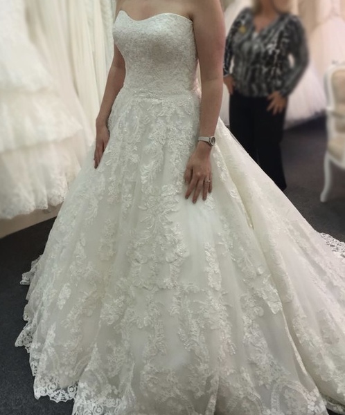 to ask how much your wedding dress was?