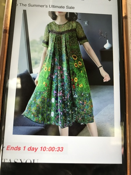 Saw a green midi length dress with loads of meadow flowers, i must find it please help!