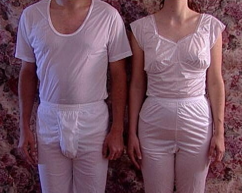 Wearing pants in bed.