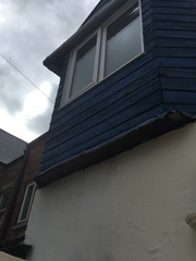 Weird wooden extension above kitchen- second bedroom