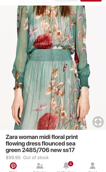 Saw a green midi length dress with loads of meadow flowers, i must find it please help!