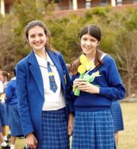 Why did schools change and wear sweatshirts and cheap blazers?