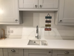 Undermount sink - ceramic or stainless steel? Or a composite?