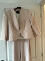 Please help me choose an outfit for my wedding which is not a dress