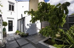 Dark or light grey fence in garden?