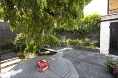 Dark or light grey fence in garden?