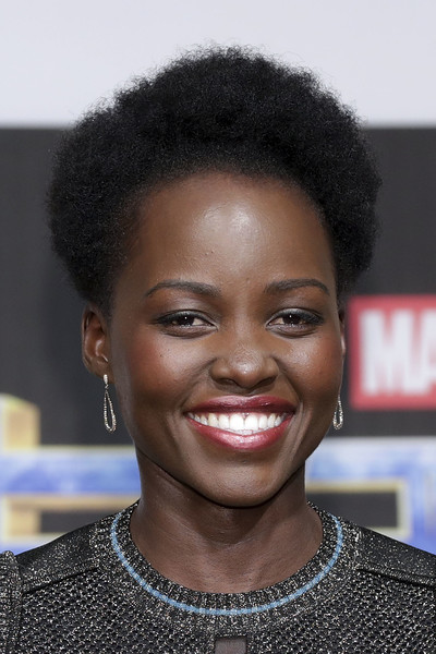 Aibu to abandon my beliefs to get ahead. Afro hair.