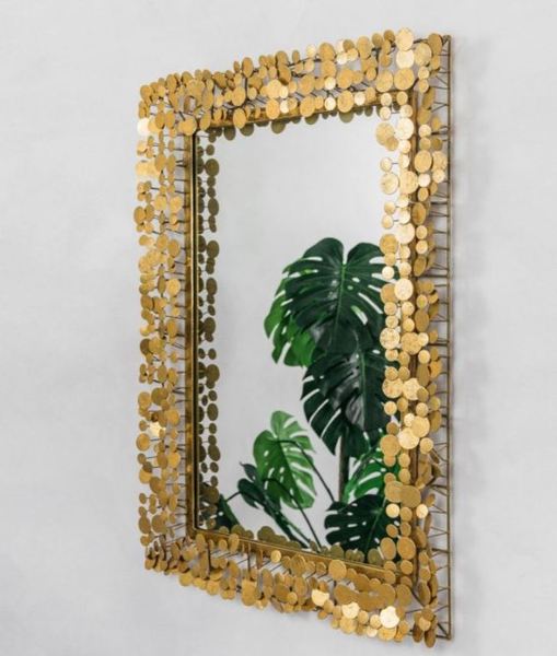 Who's dead handy around here? Help me build this mirror frame please.