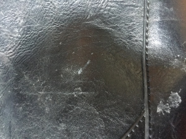 Can I hand wash a leather bag