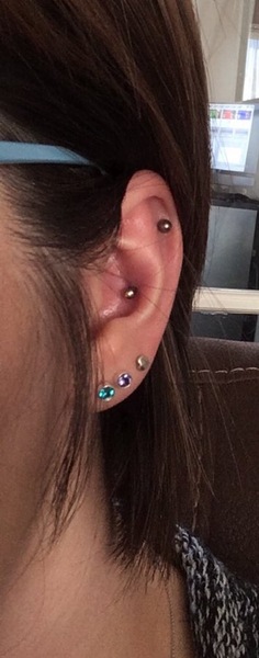 Another ear piercing...