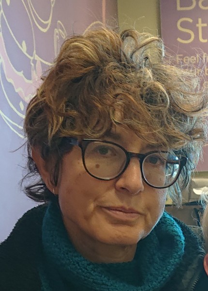 Please help me choose a hairstyle. Wavy/curly shortish. Previous pics included.