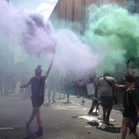 Trans activists smoke bomb protest the metro