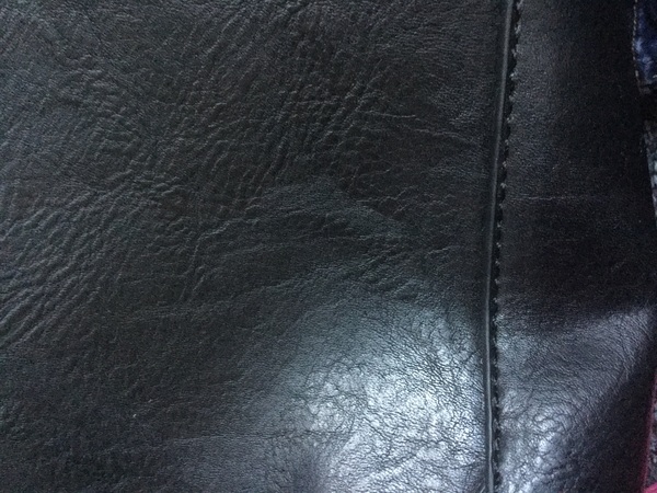 Can I hand wash a leather bag