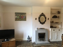 Help with asymmetrical fireplace in lounge