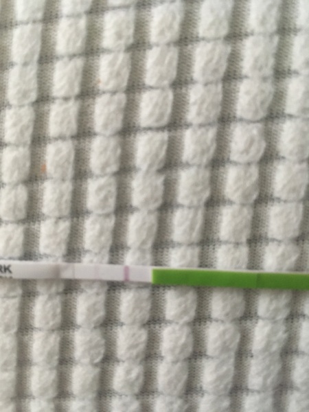 Is this an Positive OPK?(pic included) 1 day late of period?