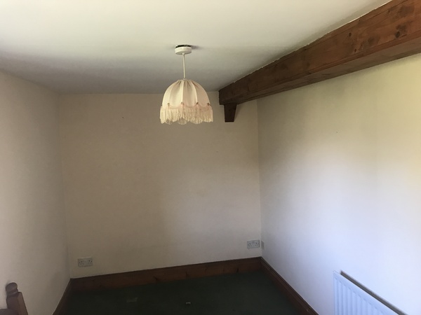 Paint these cottage beams white??