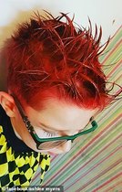 To think you should notice you are spraying SPRAY PAINT on your child's head?