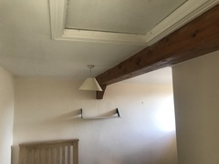 Paint these cottage beams white??