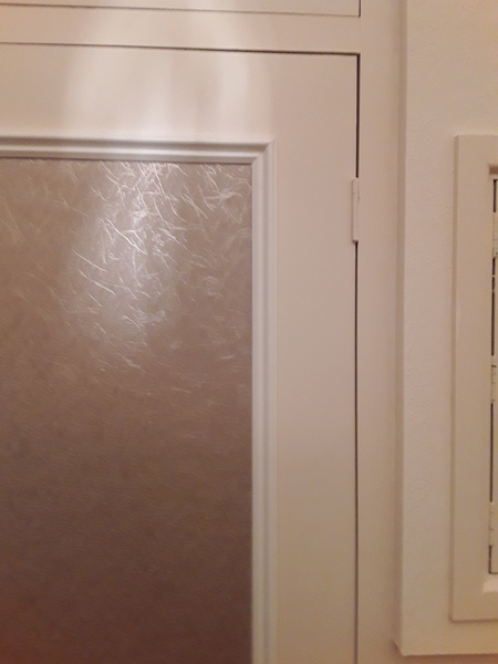 What can I do about these poorly fitted cupboard doors?