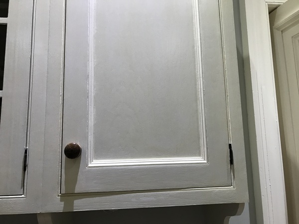 What can I do about these poorly fitted cupboard doors?
