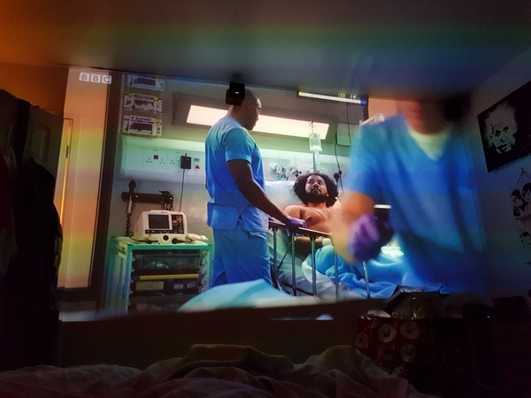 Does anyone have a projector rather than a tv?